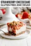 a slice of vegan strawberry cheesecake on a white plate with a fork
