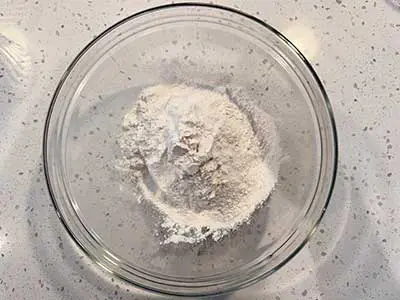 Add flour to the mixing bowl