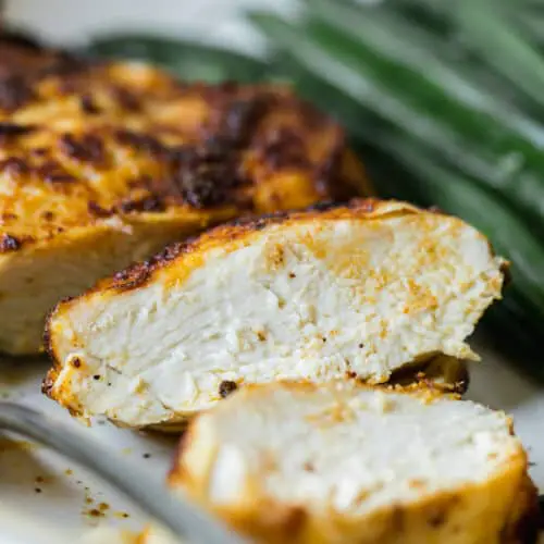 cut open and inside of an air fryer chicken breast on a plate