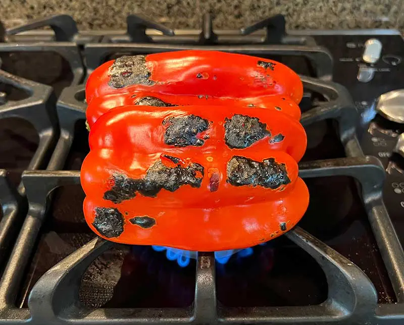 Roast the peppers evenely