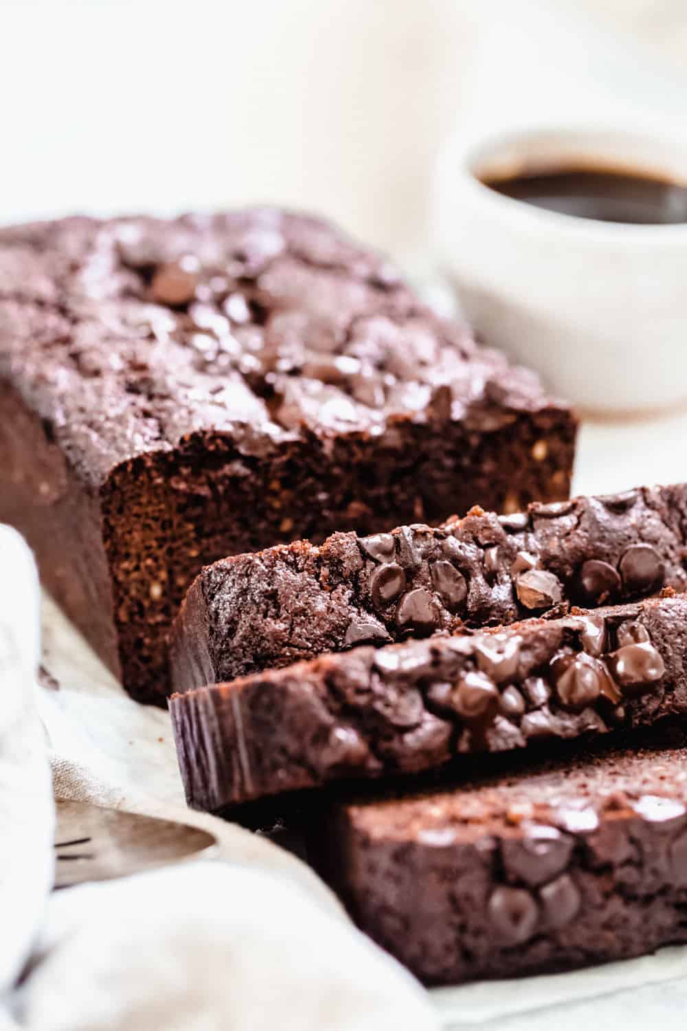 This super decadent paleo chocolate zucchini bread is so moist and the perfect breakfast, dessert or on-the-go snack for you. This zucchini bread is gluten free, dairy free and refined sugar free. #paleo #zucchinibread #glutenfree #chocolate