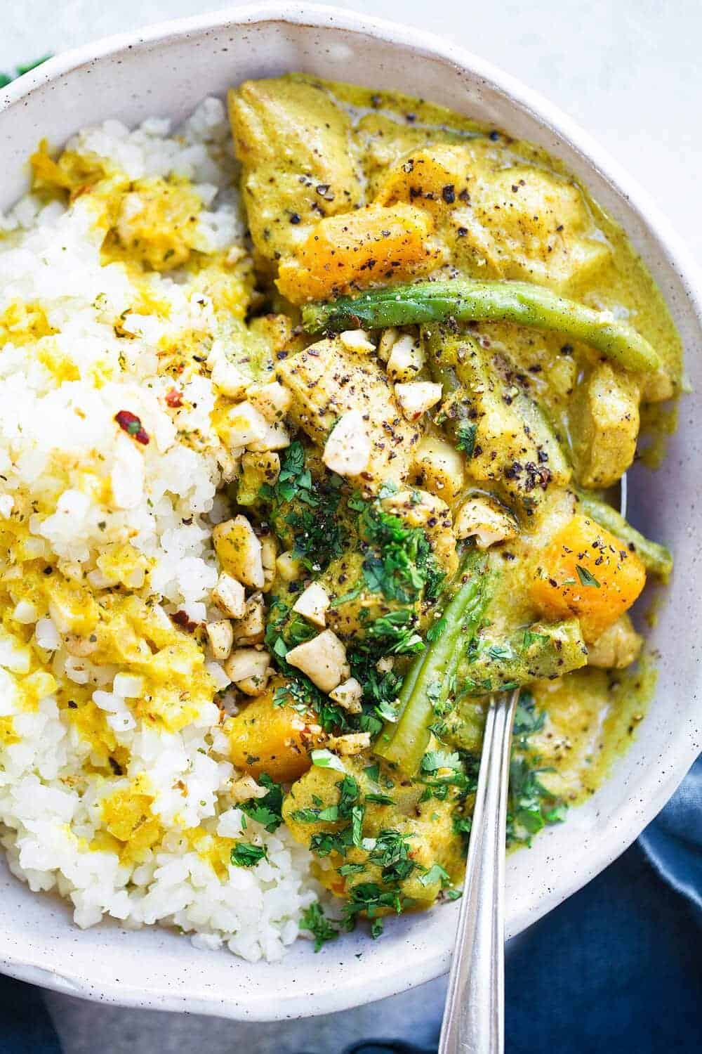 10 Minute Whole30 Curry easy whole30 dinner or lunch recipe- made with chicken thighs, butternut squash, cauliflower and greens… healthy and so easy! Easy Whole30 Curry. Whole30 curry recipes. Whole30 meal ideas. whole30 meal plan. Easy whole30 dinner recipes. Easy whole30 dinner recipes. Whole30 recipes. Whole30 lunch. Whole30 meal planning. Whole30 meal prep. Healthy paleo meals. Healthy Whole30 recipes. Easy Whole30 recipes. Easy whole30 dinner recipes.