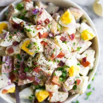 Dairy Free Whole30 Potato Salad. The best paleo potato salad recipe with bacon and eggs. A low carb, dairy free potato salad recipe. Easy whole30 side dishes. Whole30 sides. Easy whole30 dinner recipes. Whole30 meal ideas. whole30 meal plan. Whole30 snacks. Whole30 recipes. Whole30 lunch. Whole30 meal planning. Whole30 meal prep. Healthy paleo meals. Healthy Whole30 recipes. Easy Whole30 recipes.
