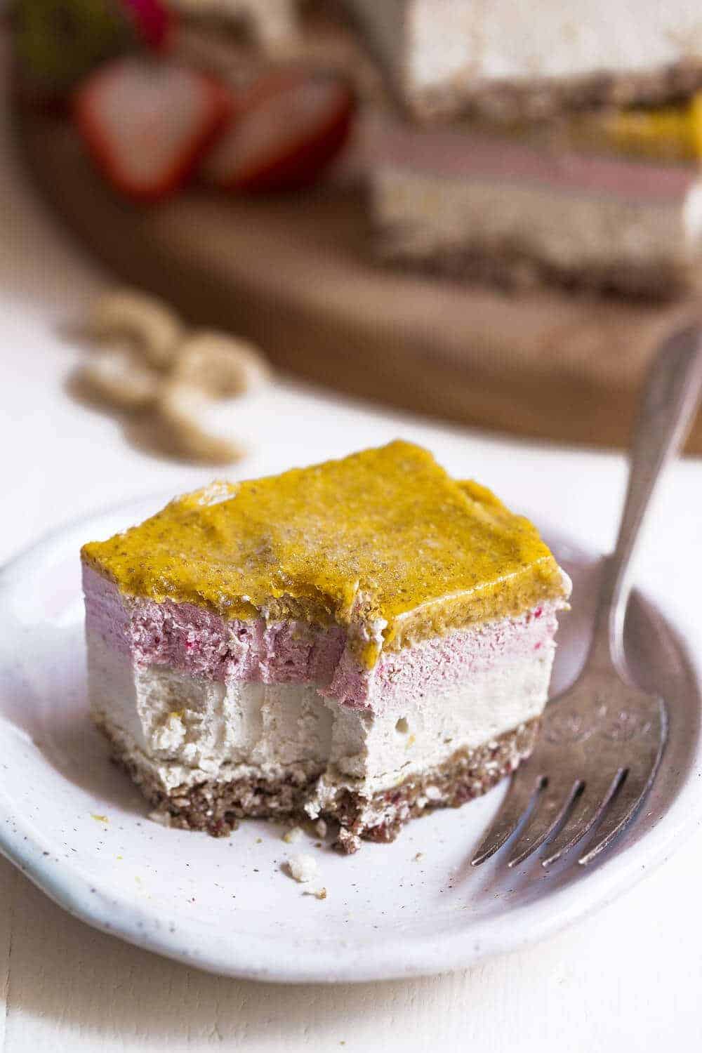 Strawberry & mango cheesecake bars with a granola crust