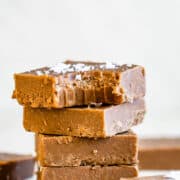 dairy free fudge stacked high with a bite taken out