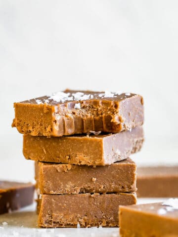 dairy free fudge stacked high with a bite taken out