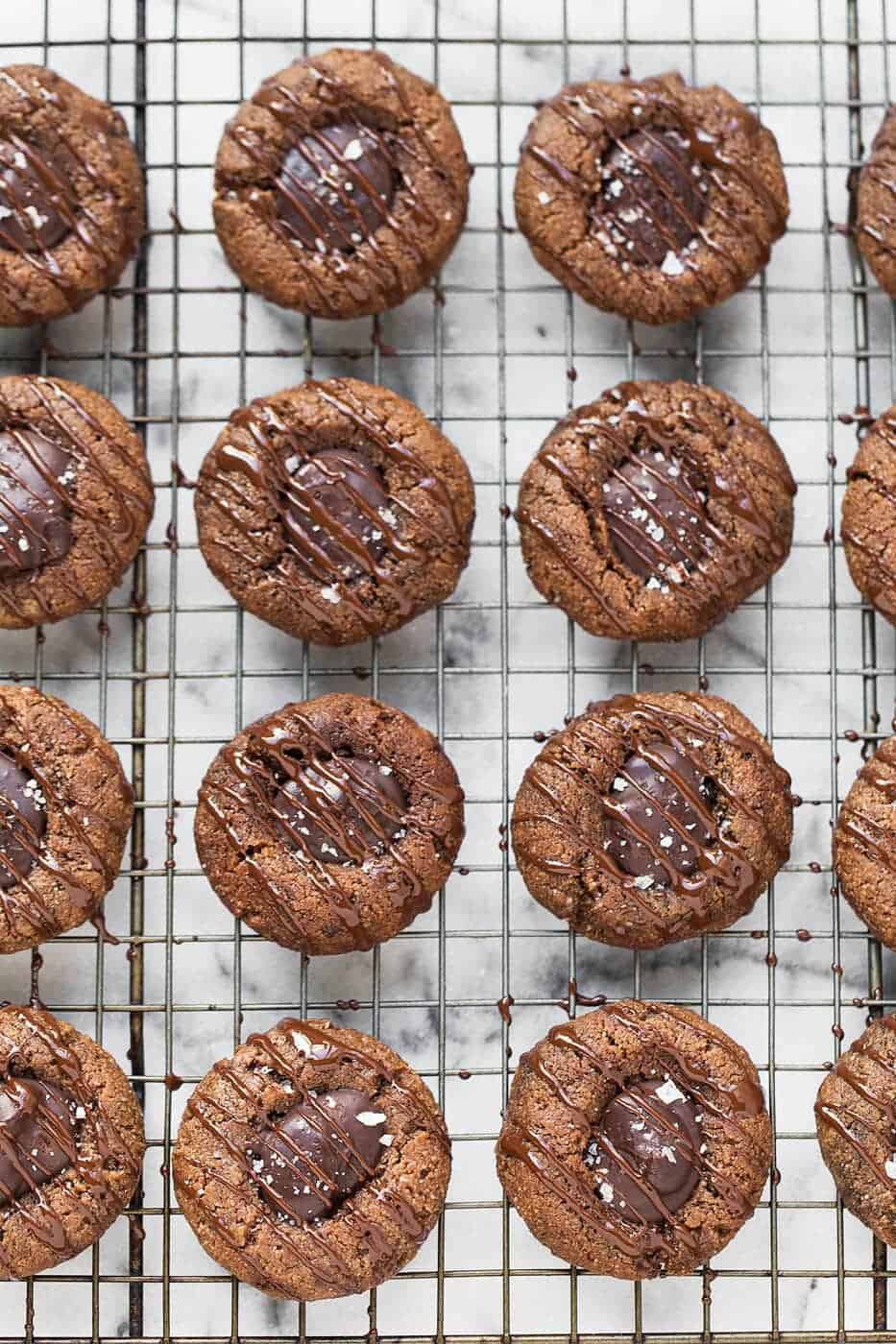Double Chocolate Vegan Thumbprint Cookies on a wire rack