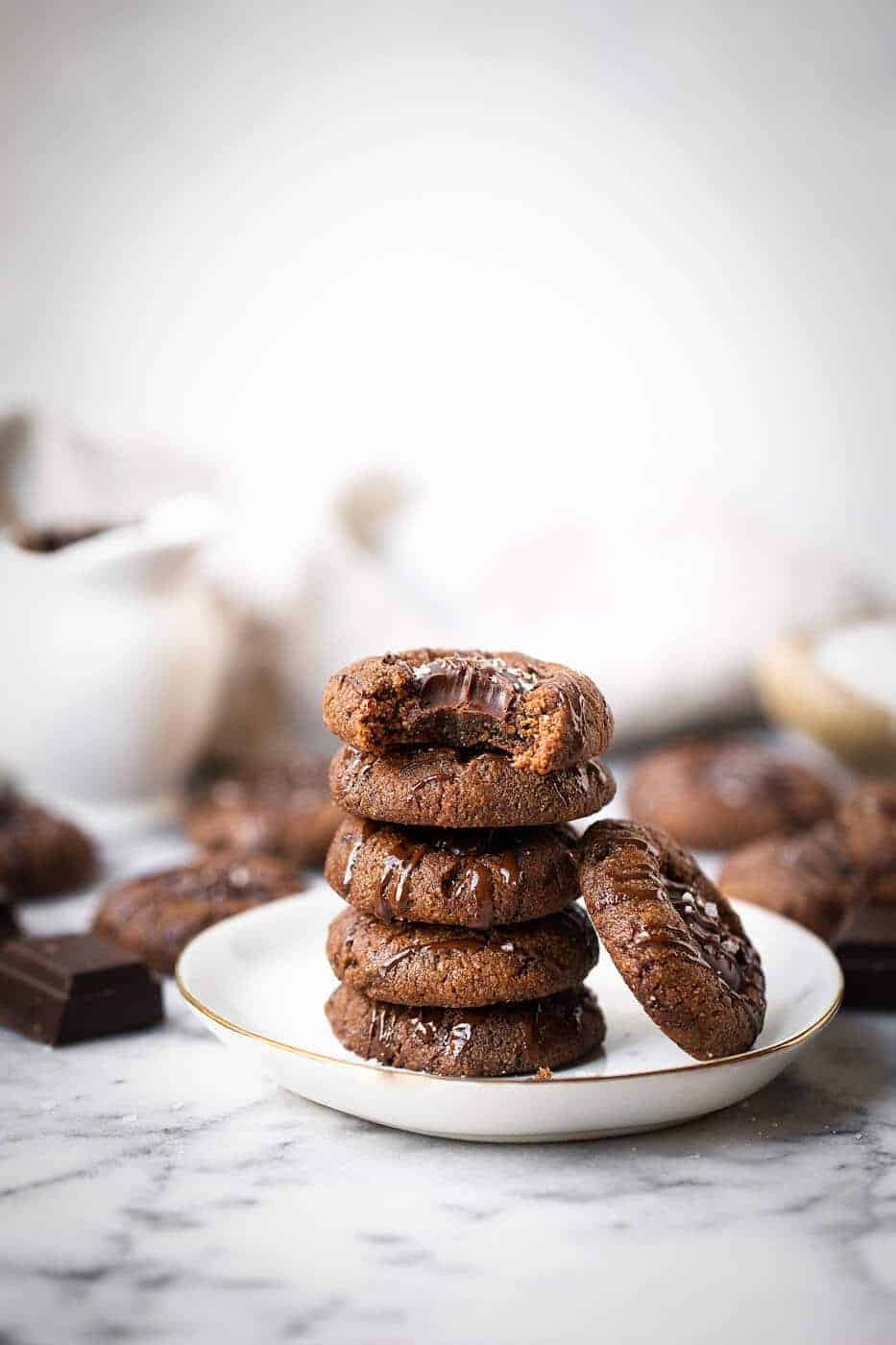 Double Chocolate Vegan Thumbprint Cookies stacked in a bowl