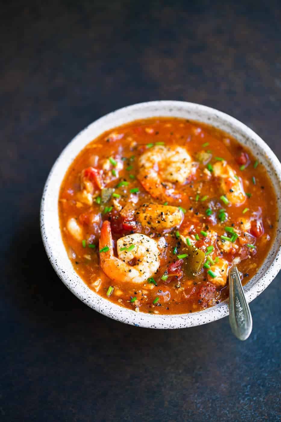 seafood gumbo garnished with fresh chives