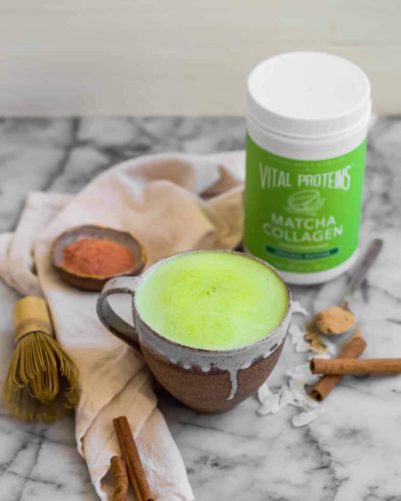 Motcha drink overflowing in a cup with vital proteins match collagen 