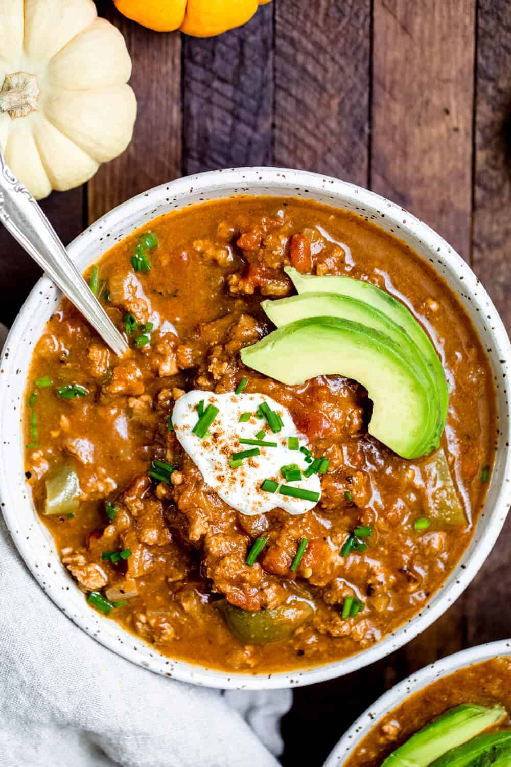 paleo pumpkin chili on a wooden table
