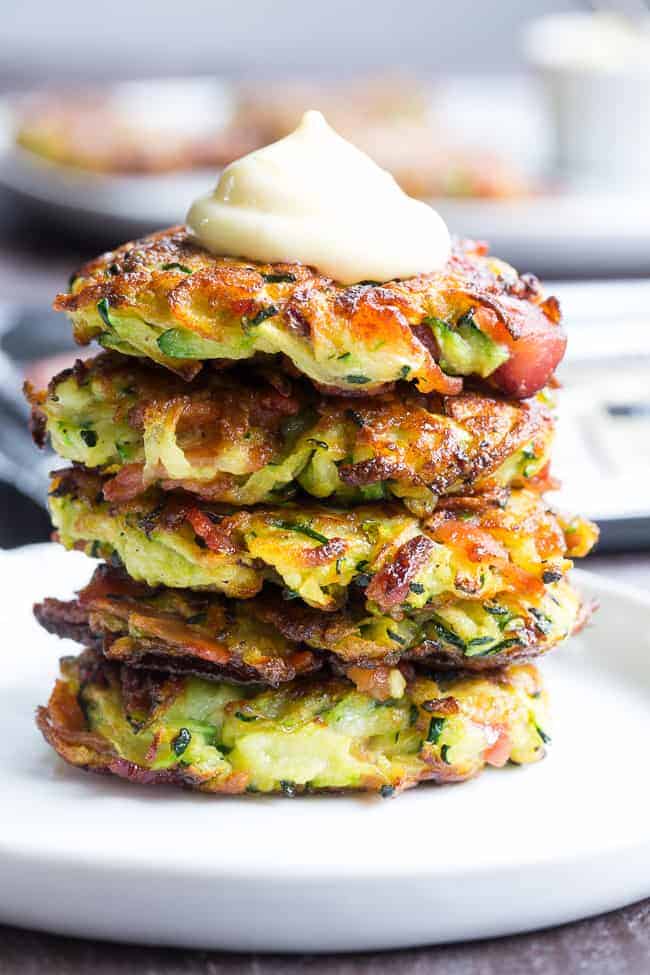 Zucchini fritters stacked on top of each other