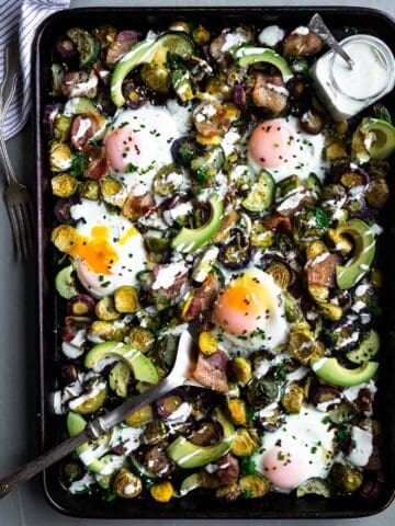 The easiest paleo one pan breakfast recipe that's great for the whole family. Topped off with a homemade, creamy ranch and perfect reheated as leftovers. #paleo #breakfast #whole30recipes #whole30