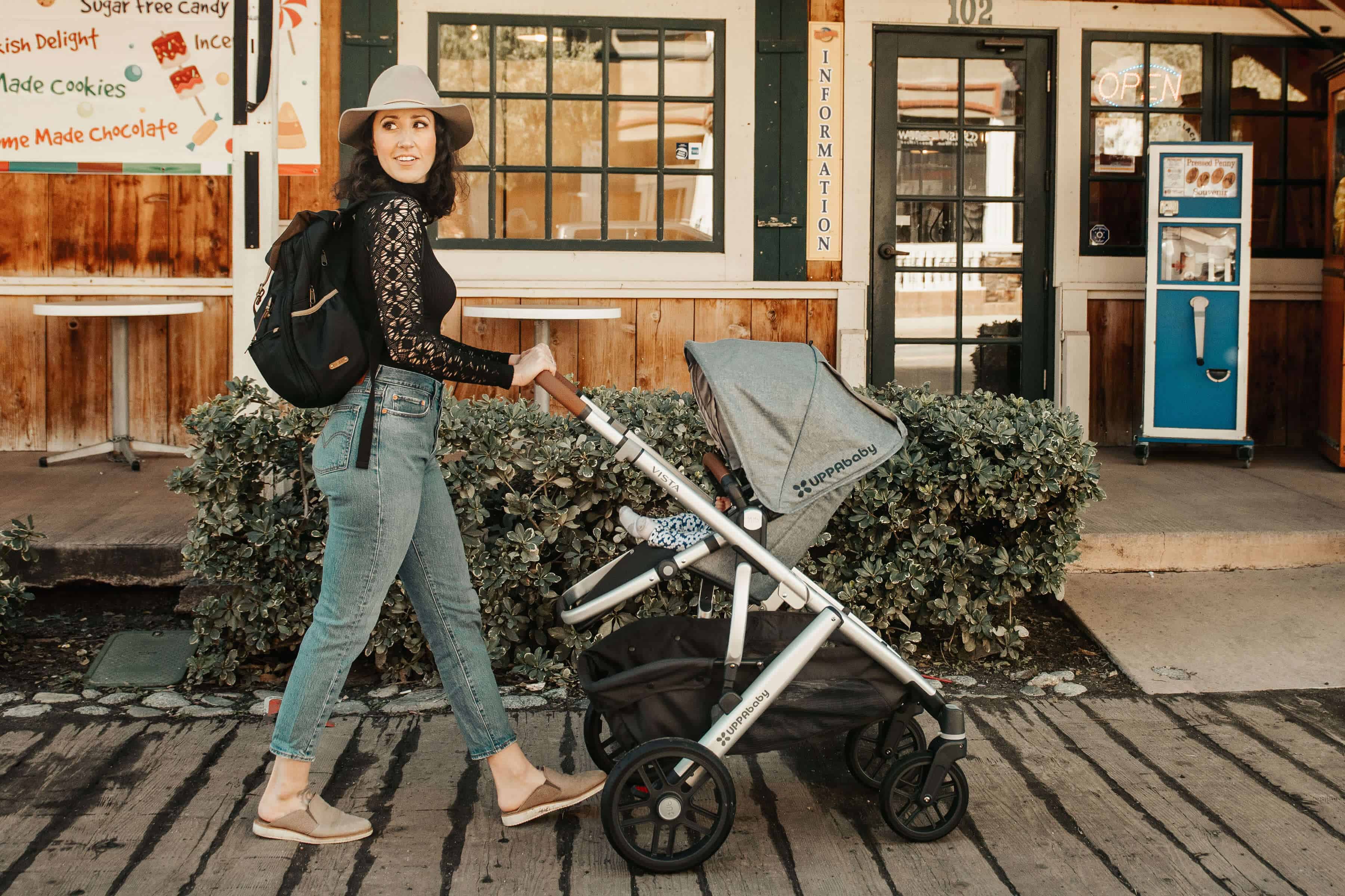 Woman with a baby stroller