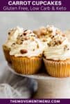 carrot cake cupcakes on a cake stand with crushed walnuts on top