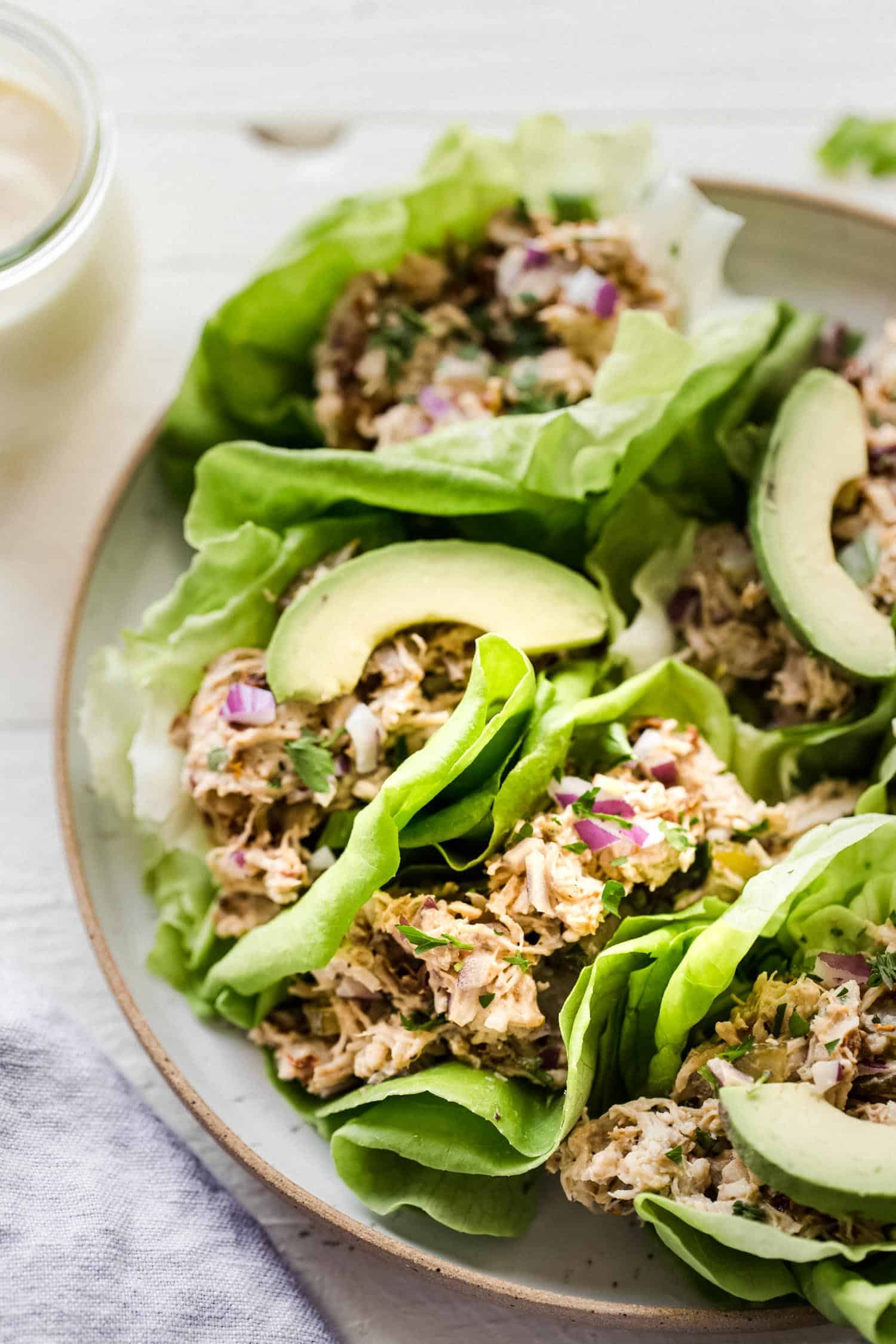 paleo chicken salad in lettuce wraps with avocado