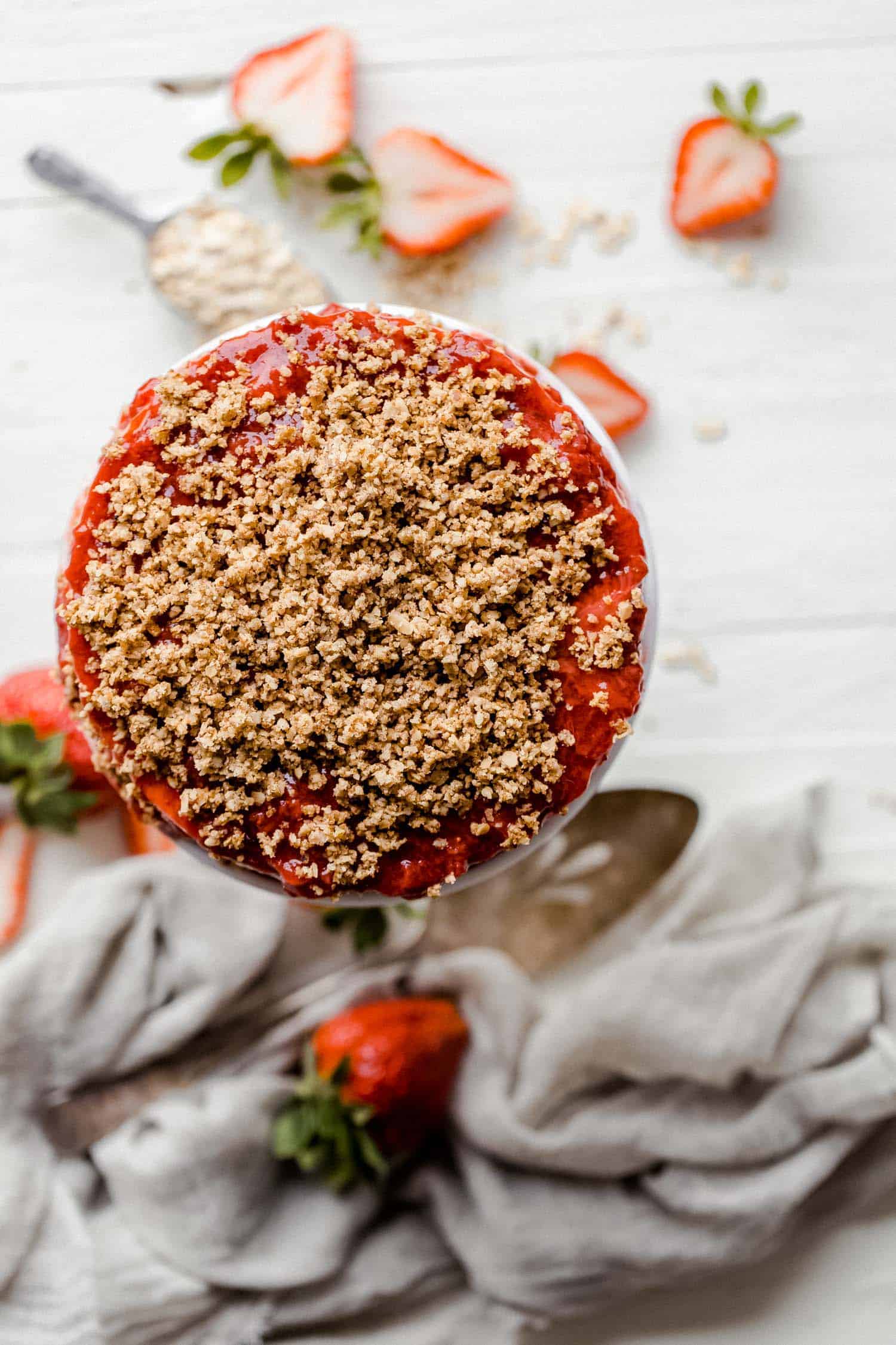 vegan strawberry cheesecake with oat crumble on top