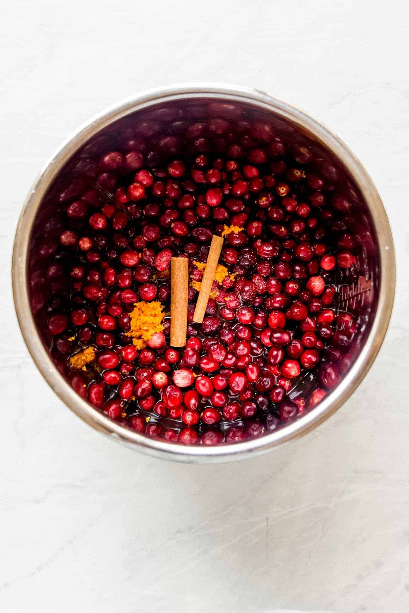 cranberries, spices and orange zest in a mixing bowl