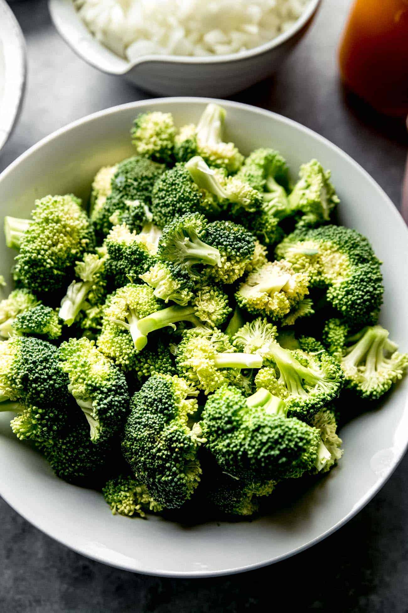 broccoli florets in a white bowl