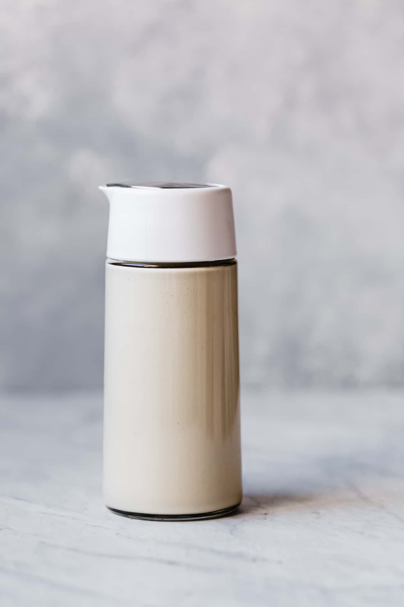 french vanilla creamer in a glass pouring vessel