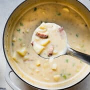 creamy potato soup in a large white pot