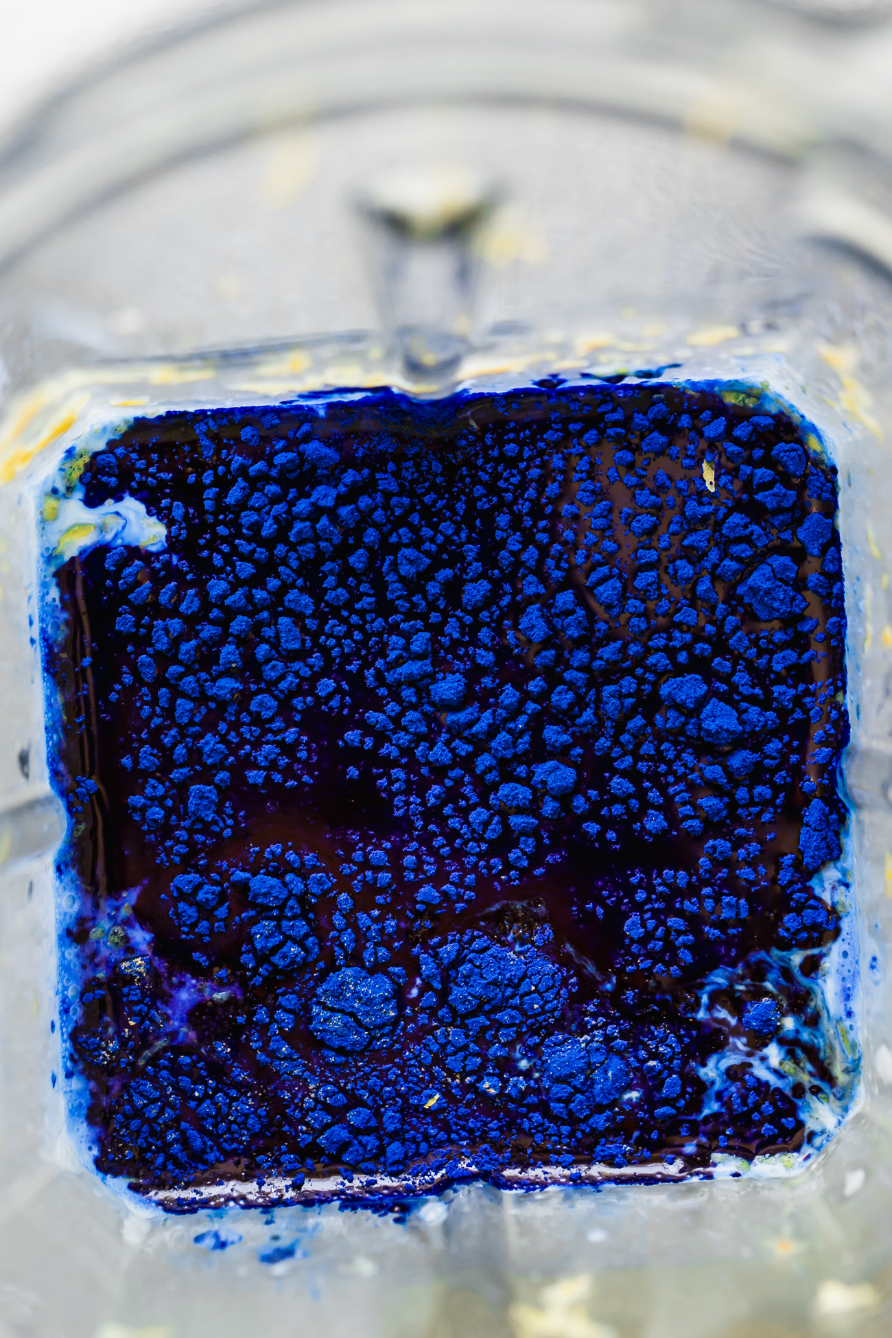 blender pitcher full of blue spirulina
