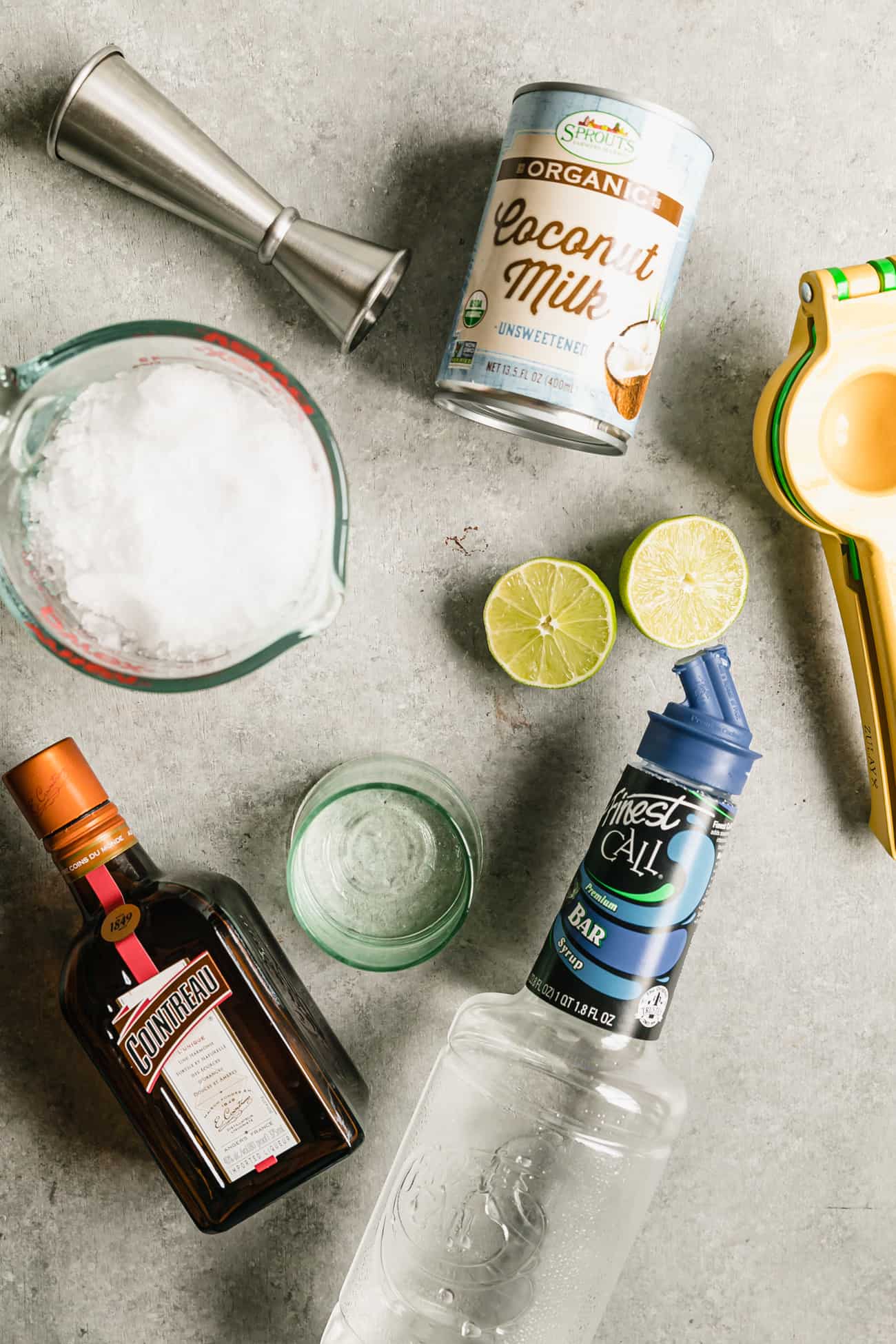 ingredients laid out to make coconut margaritas